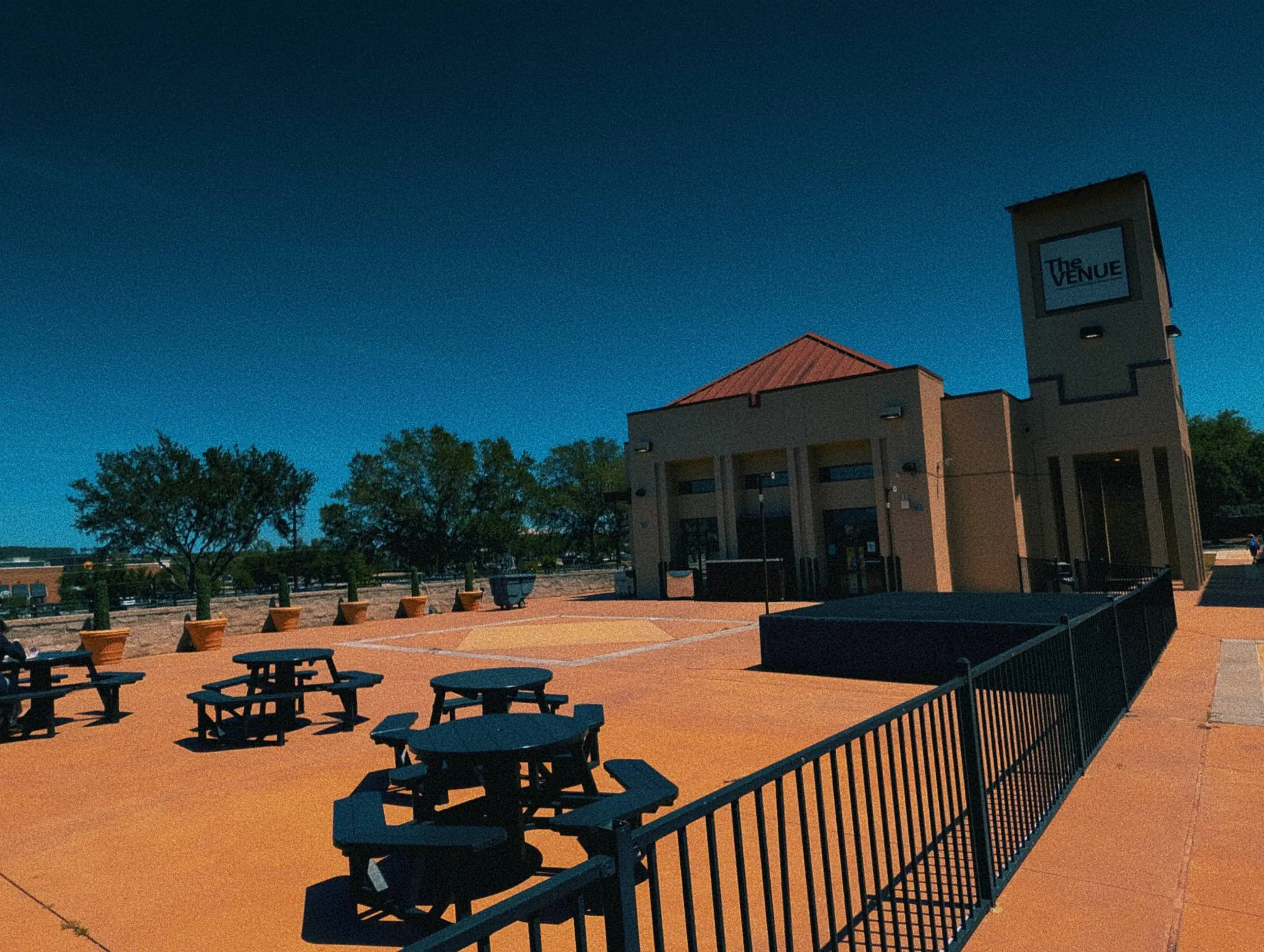 Outdoor seating area and patio at The Venue Clermont for guest mingling
